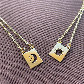 Escapulrio sol e lua em prata 925 e ouro 18k.